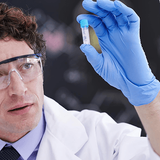 Lab researcher inspecting a sample